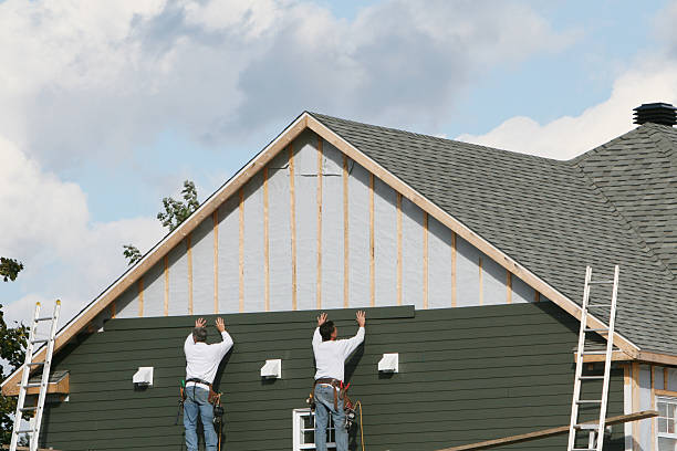 Professional Siding Contractor technician working in Beach City, OH